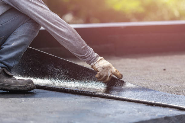 Professional Basement Waterproofing technician working in Port Royal, KY
